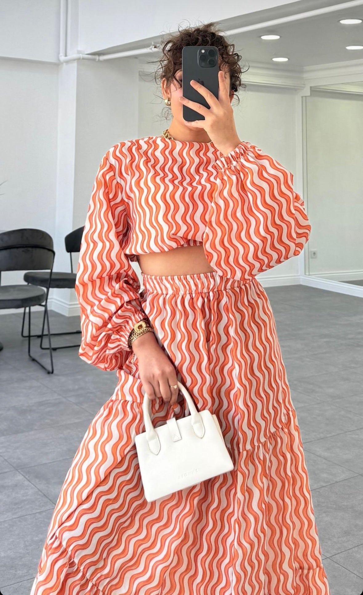2 DELIGE CO-ORD SET MET LANGE ROK EN TOP - ORANJE